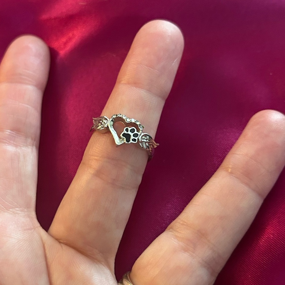 Steel ring size 7 1/2. Paw Print with Heart and Angel Wings